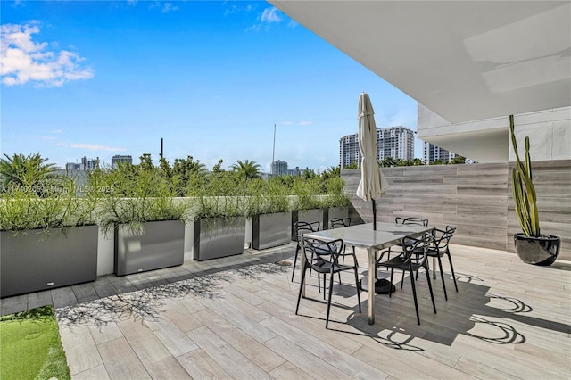 1201 20th St Unit 313, Miami Beach, FL 33139 - deck featuring a city view and outdoor dining space
