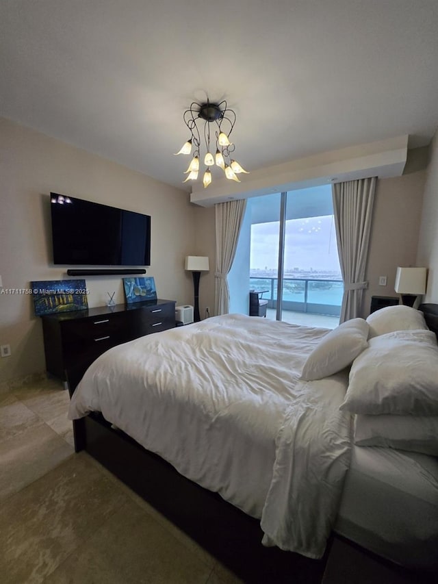 bedroom with a chandelier