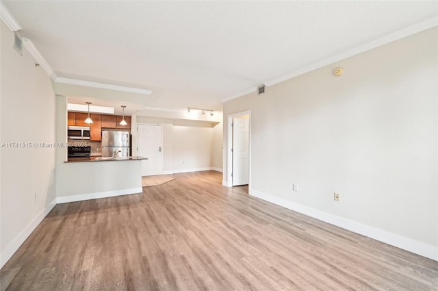 2000 N Bayshore Dr Unit 304, Miami, FL 33137 - unfurnished living room with light wood-style flooring, baseboards, and ornamental molding