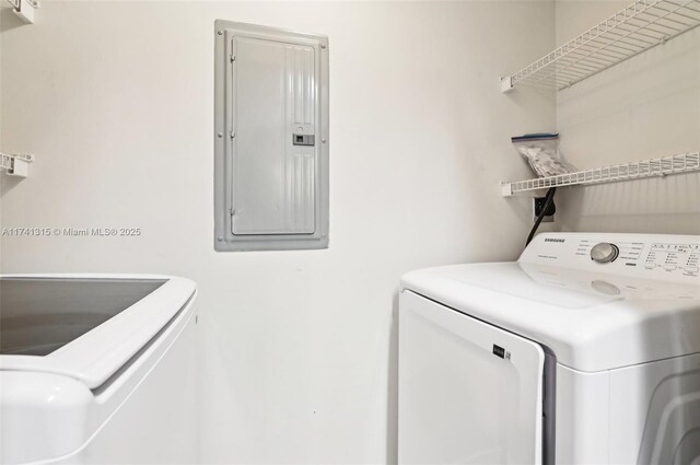 2000 N Bayshore Dr Unit 304, Miami, FL 33137 - laundry area with electric panel and separate washer and dryer