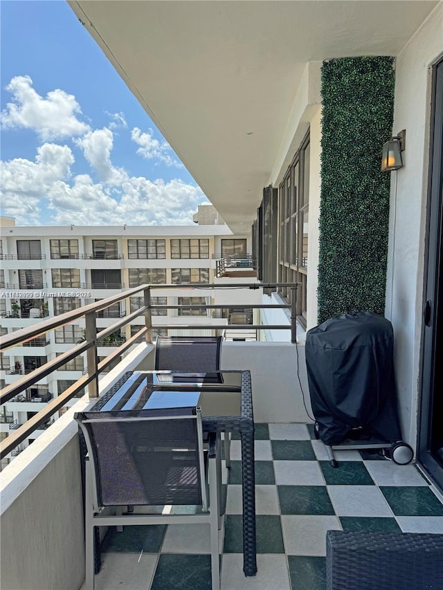 balcony featuring a grill