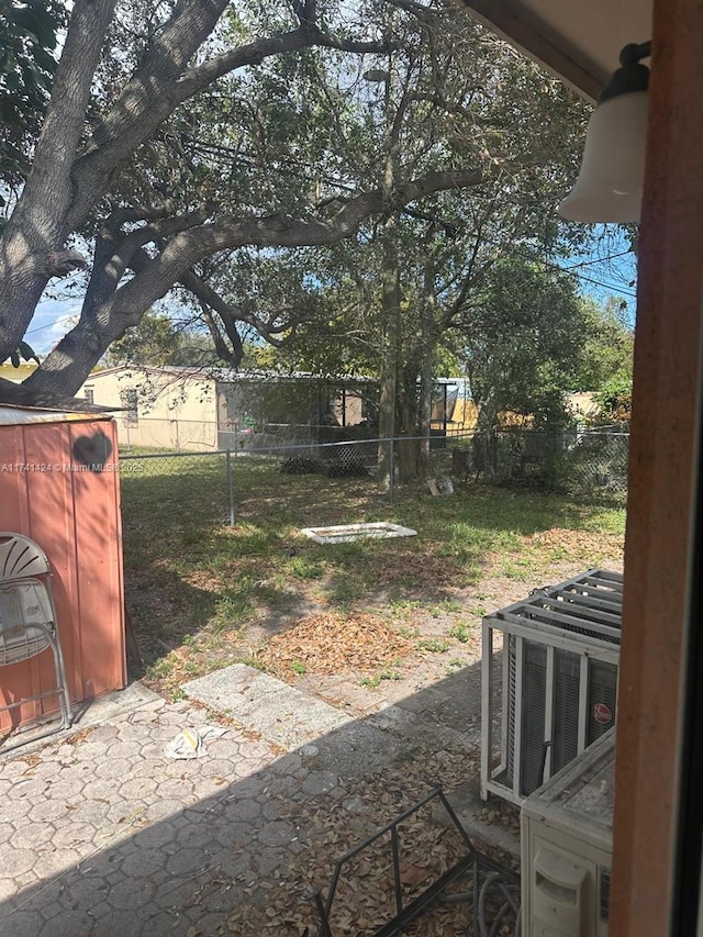 view of yard with central AC unit