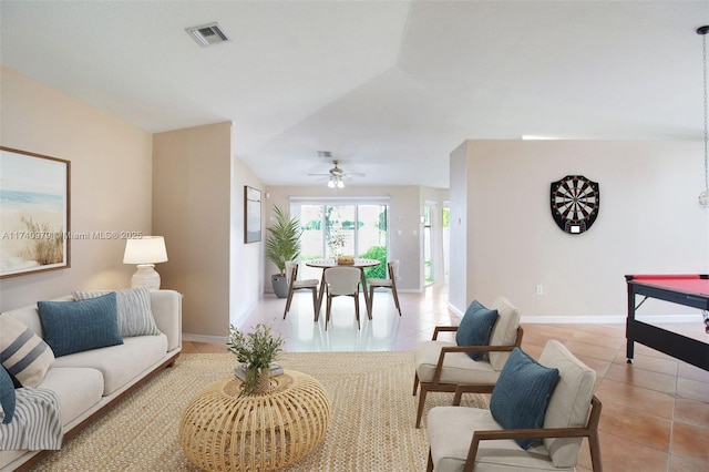 12239 SW 140th St, Miami, FL 33186 - living area featuring light tile patterned flooring, baseboards, ceiling fan, and lofted ceiling