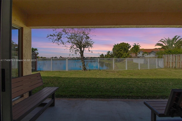 12239 SW 140th St, Miami, FL 33186 - patio terrace at dusk with a water view