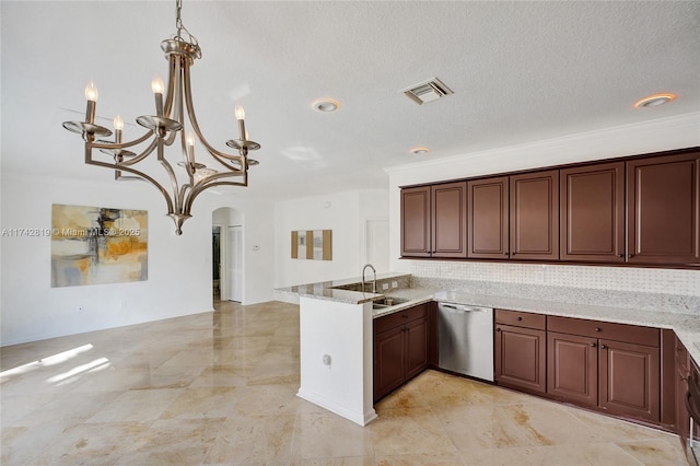 kitchen with sink, light stone counters, a textured ceiling, decorative light fixtures, and stainless steel dishwasher