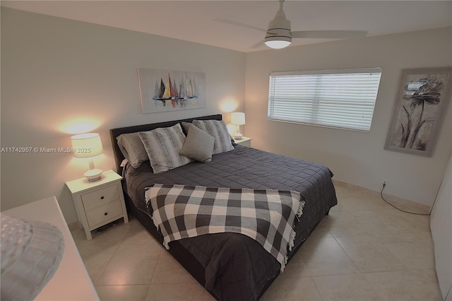 bedroom with light tile patterned flooring and ceiling fan