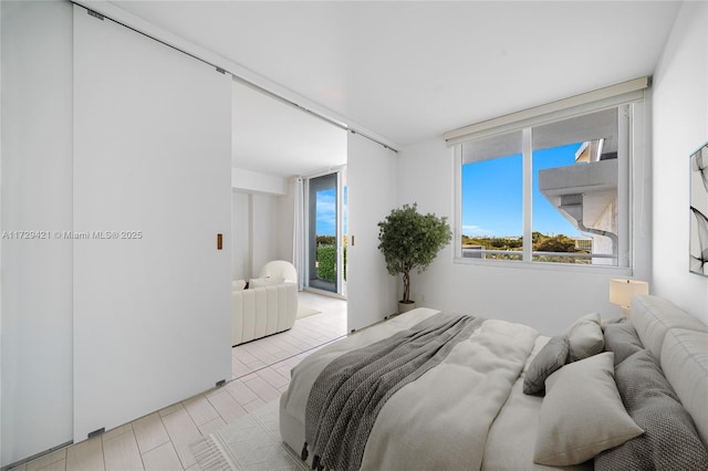 bedroom with multiple windows