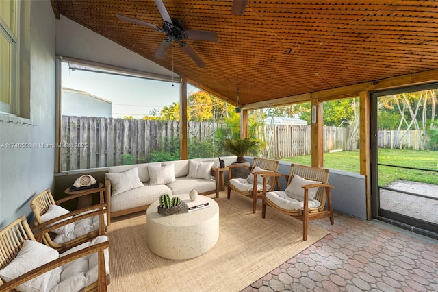 sunroom / solarium with a wealth of natural light and ceiling fan