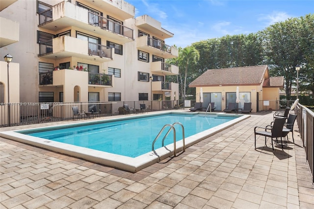 view of pool with a patio area