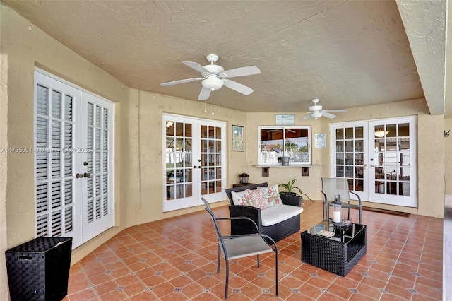 view of patio / terrace with french doors and ceiling fan