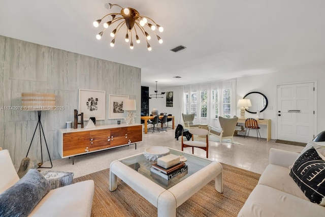 living room with a chandelier