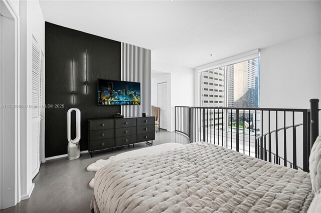 bedroom with floor to ceiling windows