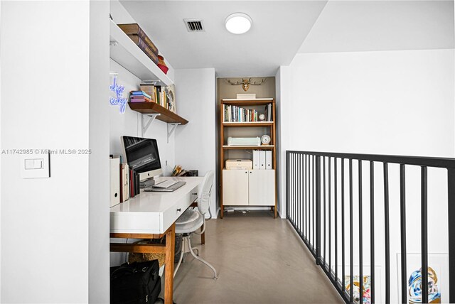 office featuring concrete flooring