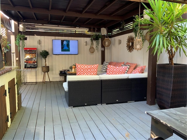 deck with an outdoor hangout area