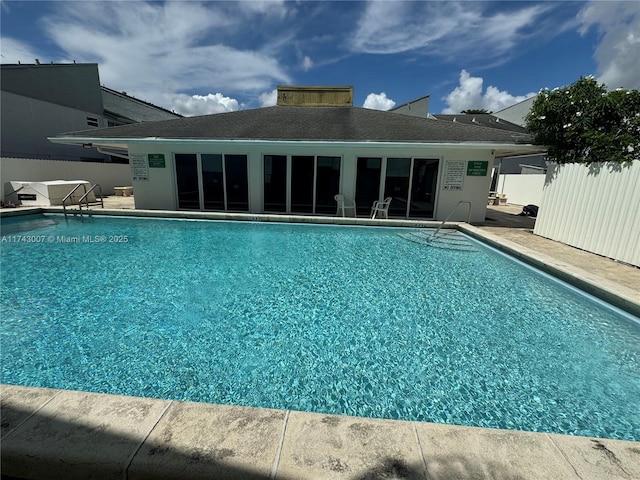 view of swimming pool with a patio area