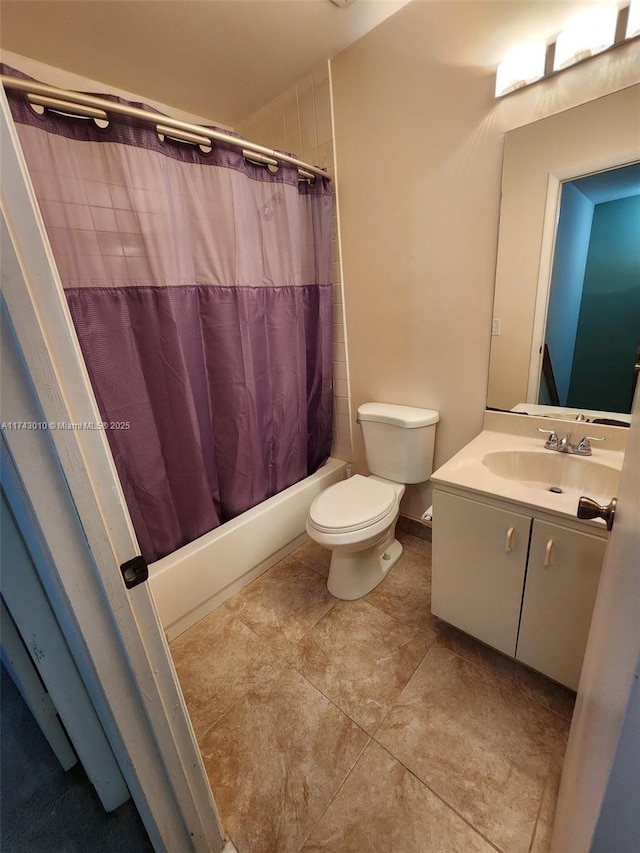 full bathroom featuring vanity, shower / bath combo, tile patterned floors, and toilet