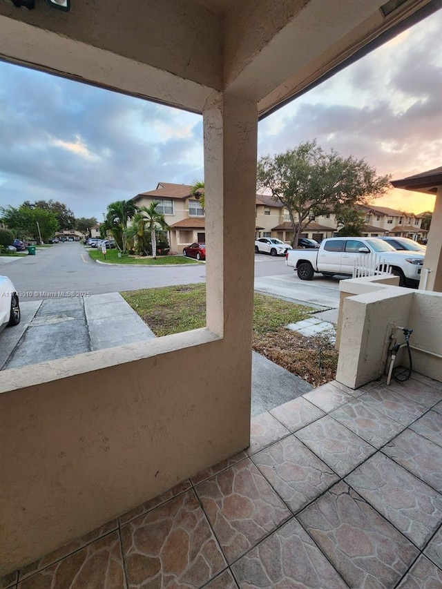 view of patio terrace at dusk