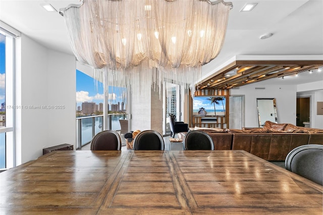 dining area with floor to ceiling windows