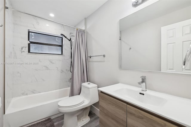 full bathroom featuring vanity, toilet, and shower / bathtub combination with curtain