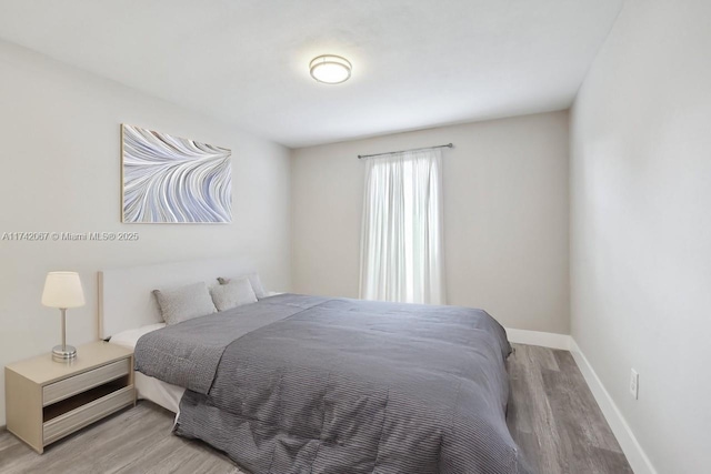 bedroom with light hardwood / wood-style floors