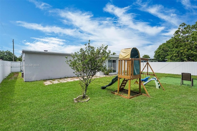 view of jungle gym featuring a yard