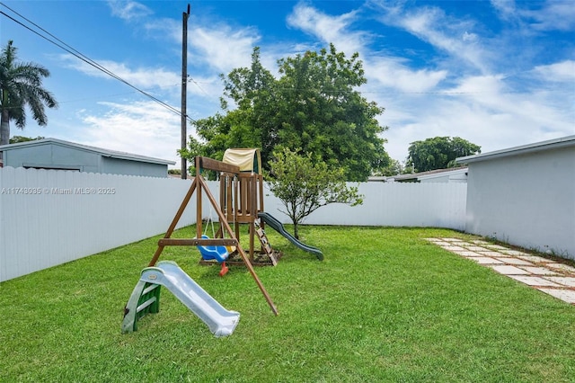 view of jungle gym with a yard