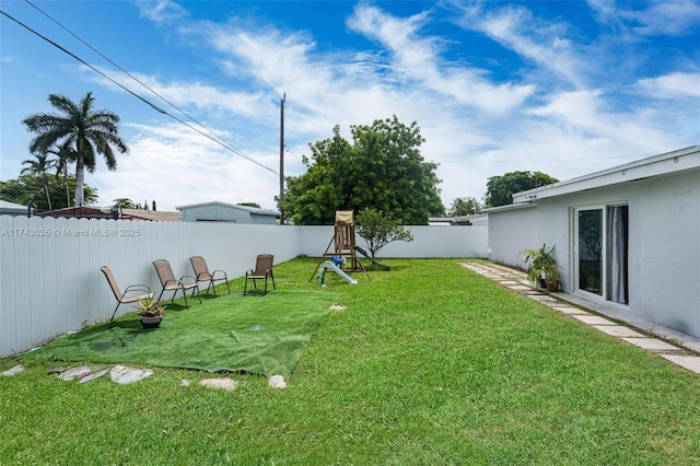 view of yard with a playground