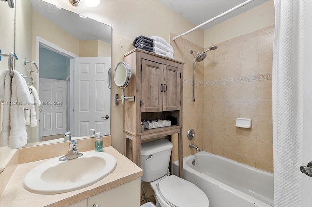 full bathroom with vanity, toilet, and shower / tub combo