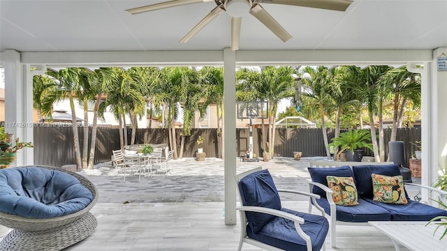 exterior space with plenty of natural light and ceiling fan