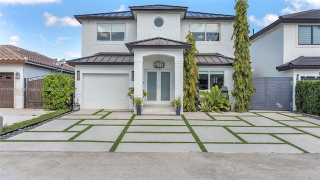 view of front of house featuring french doors and a garage