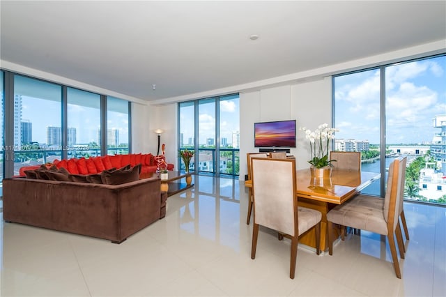 dining space with plenty of natural light and expansive windows