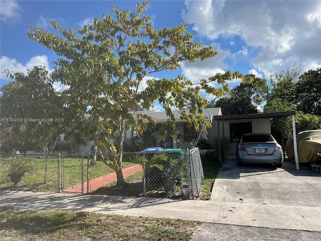 view of front of property with a carport