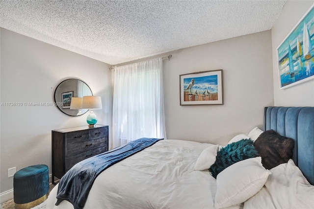 bedroom with a textured ceiling