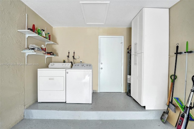 washroom with independent washer and dryer