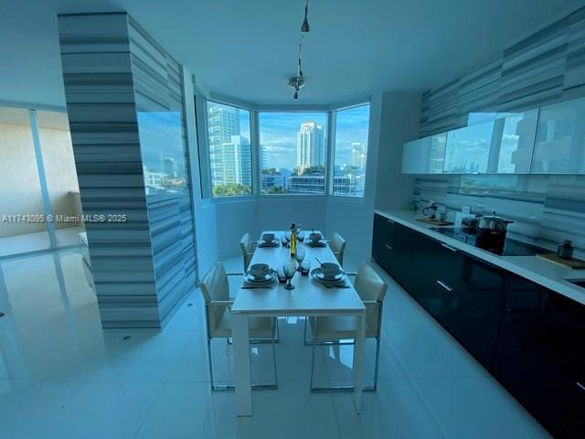 kitchen featuring hanging light fixtures and light tile patterned floors