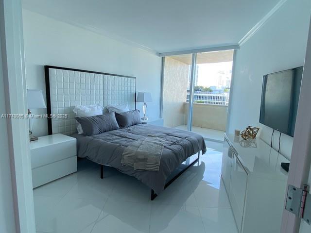 bedroom with crown molding