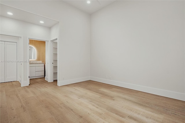 unfurnished bedroom with light hardwood / wood-style flooring