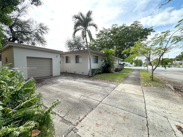 view of home's exterior with a garage