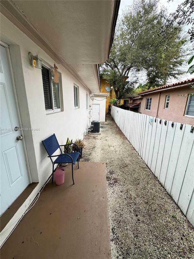 view of patio with central air condition unit