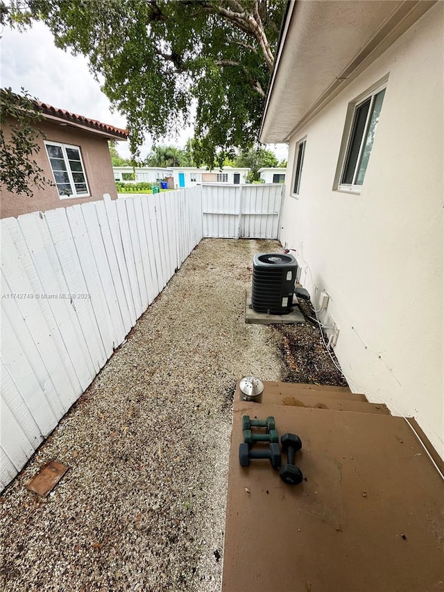 view of yard with central AC unit