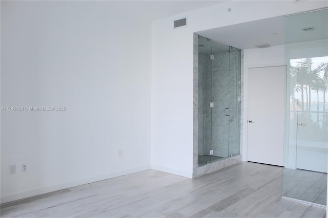 empty room featuring light hardwood / wood-style flooring