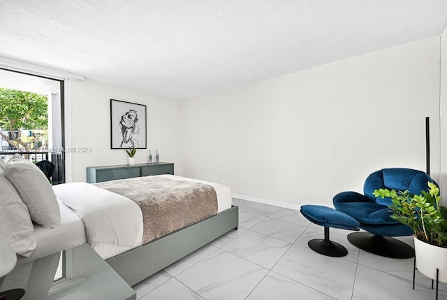 bedroom featuring a textured ceiling