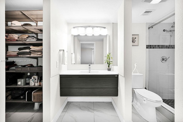 bathroom with walk in shower, vanity, and toilet