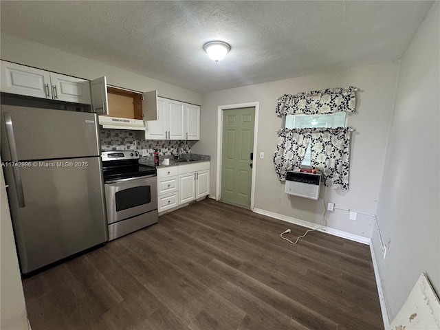 kitchen featuring dark hardwood / wood-style flooring, tasteful backsplash, stainless steel appliances, and white cabinets