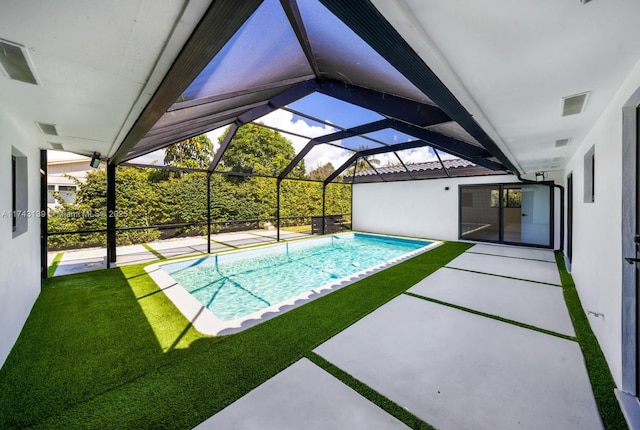 pool with a lanai and a patio