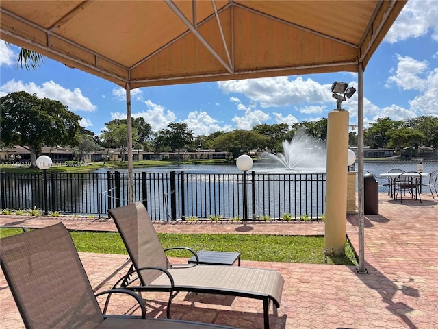 view of patio / terrace featuring a water view