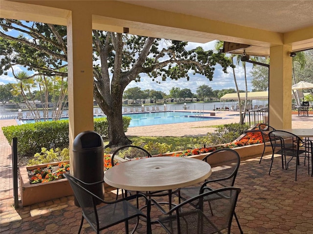 view of patio / terrace with a community pool