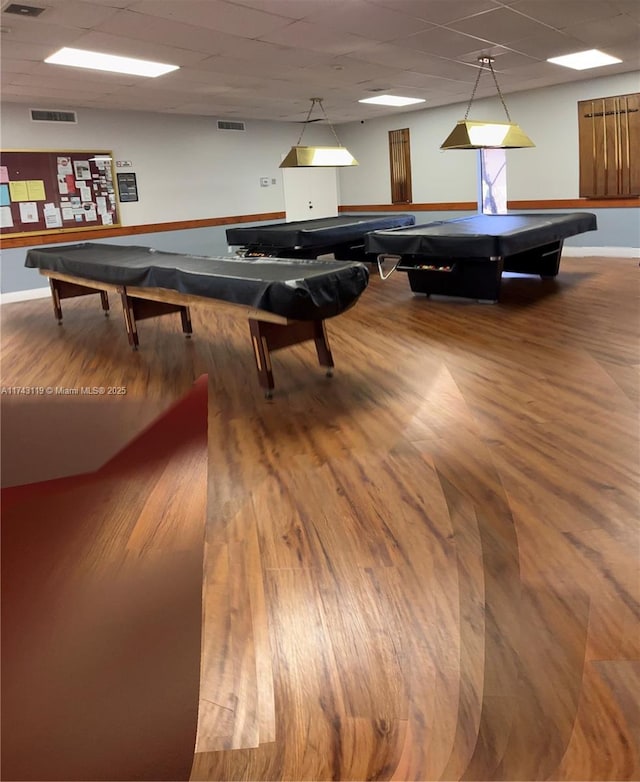 recreation room with a drop ceiling, pool table, and wood-type flooring