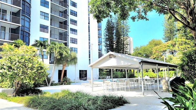 view of community with a gazebo and a patio area