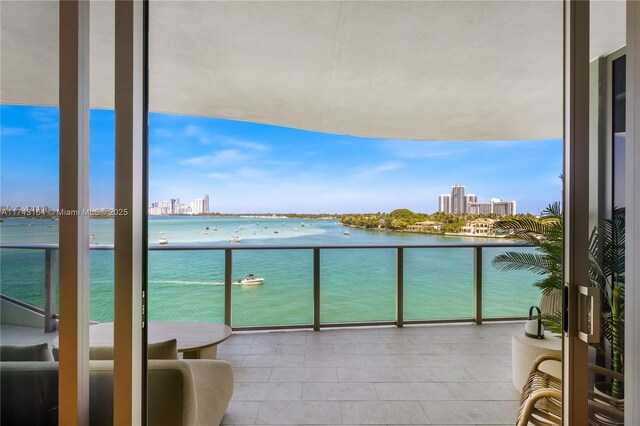 1135 103rd St Unit 602, Bay Harbor Islands, FL 33154 - balcony with a water view and a view of city